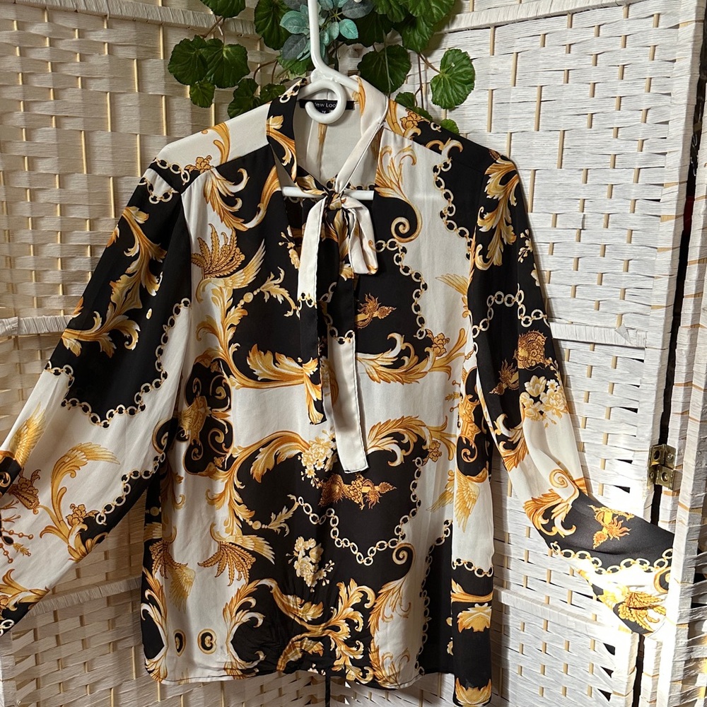 Elegant Black and Gold Blouse